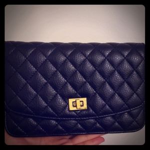 Classic black and gold crossbody/clutch